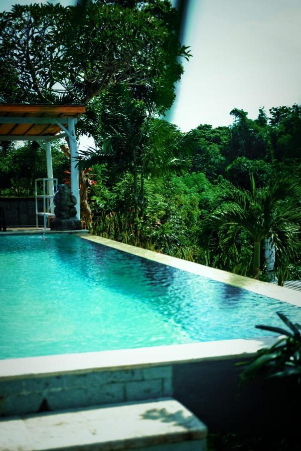 Hotel Eco Moringa Garden à Banyuwedang Extérieur photo